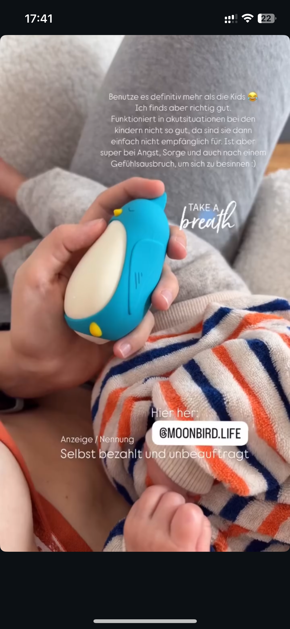 Child with moonbuddy breathing device for anxiety calm